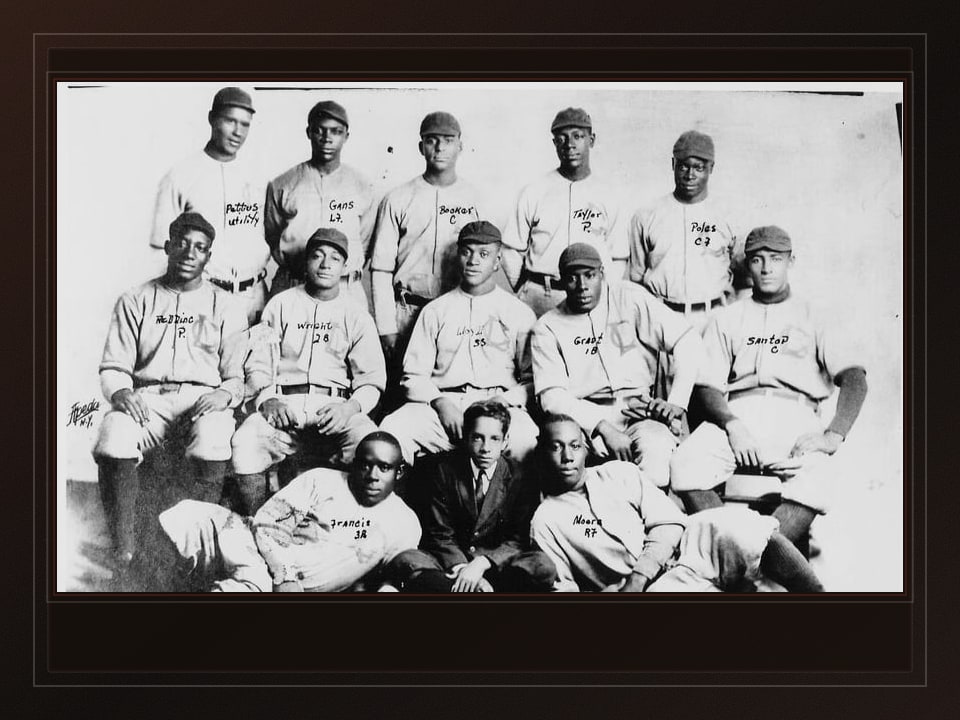 Public-domain archive plate from a 1912 Lincoln Giants team photograph connected to Cannonball Dick Redding.